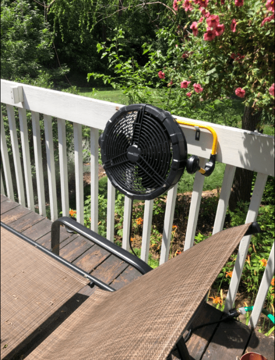 Geek Aire Battery-operated Misting Fan  - attached on the railing on the terrace